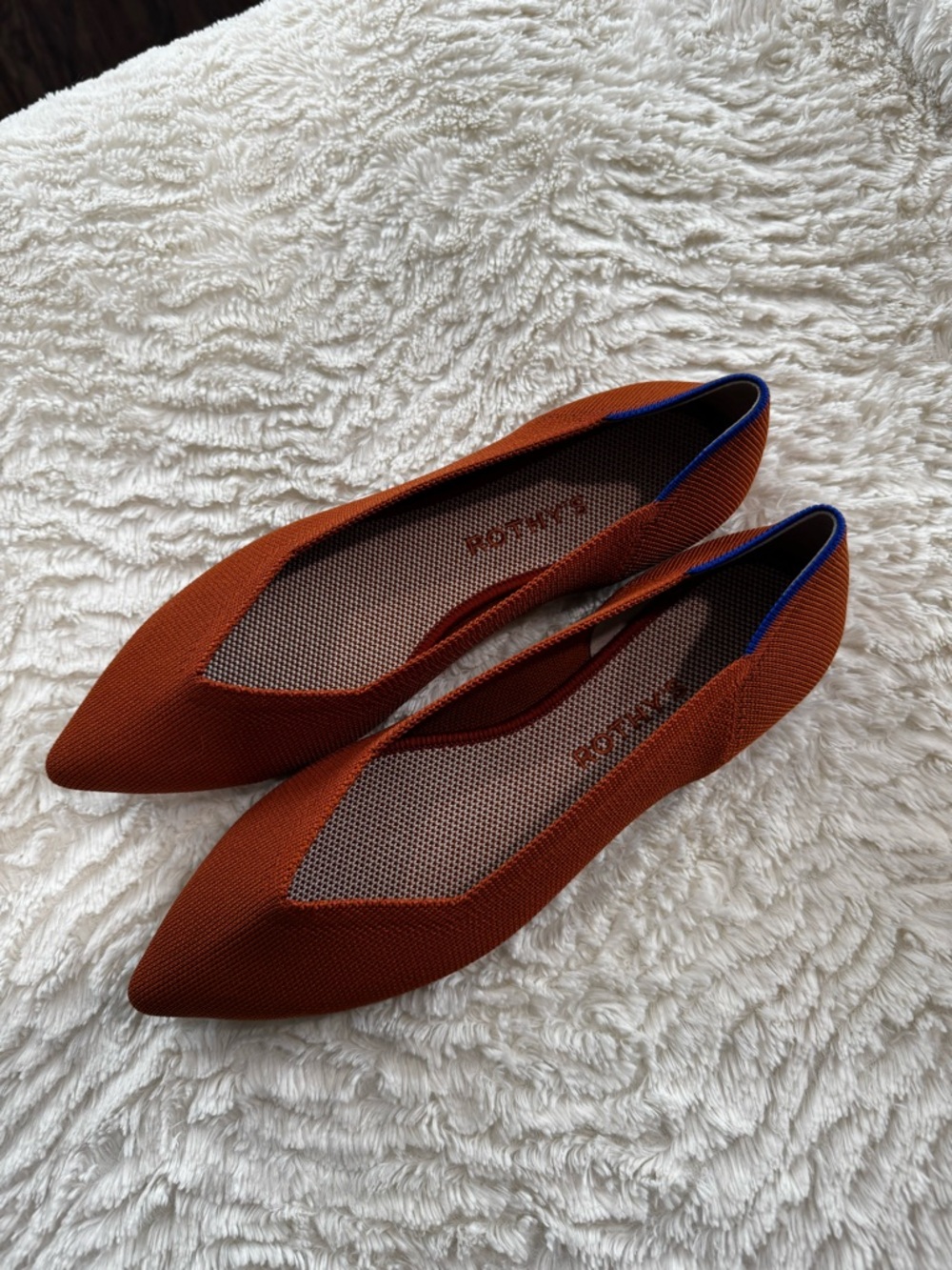 Rothy's Women's Pointed Knit Flats in Rust with Blue Trim
